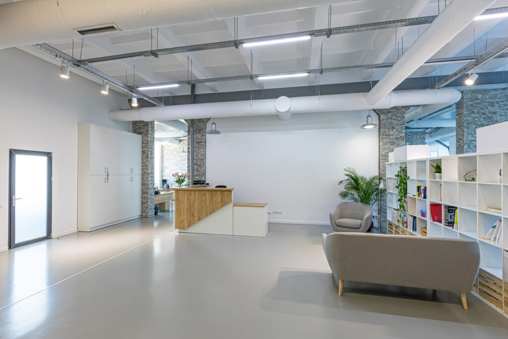 Hall of business building with light colors. interior of business office in the business center cost of interior painting - office